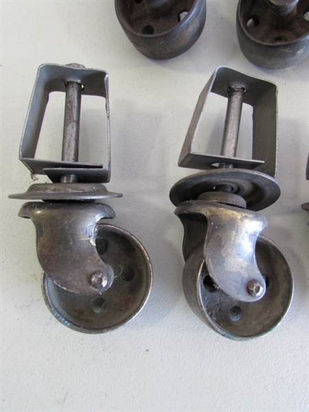 2 SETS OF 4 METAL CASTORS