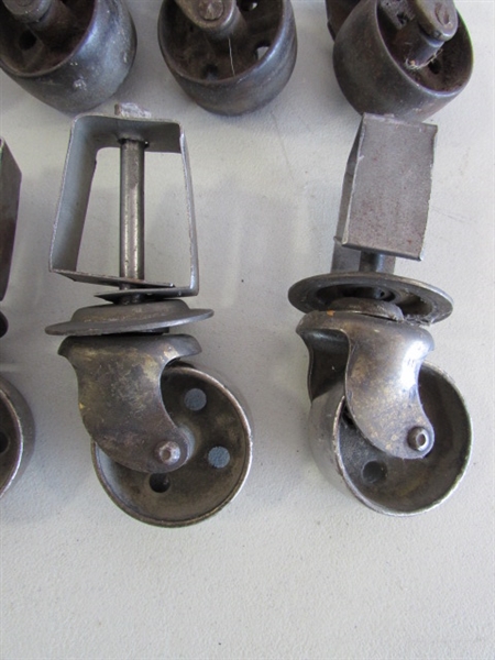 2 SETS OF 4 METAL CASTORS