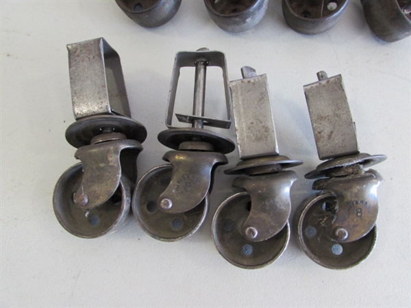 2 SETS OF 4 METAL CASTORS