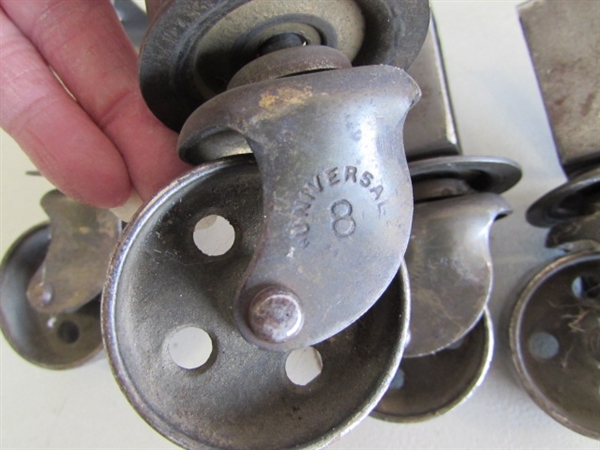 2 SETS OF 4 METAL CASTORS