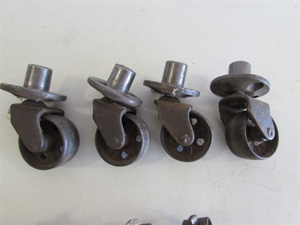 2 SETS OF 4 METAL CASTORS