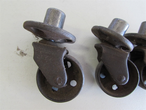 2 SETS OF 4 METAL CASTORS