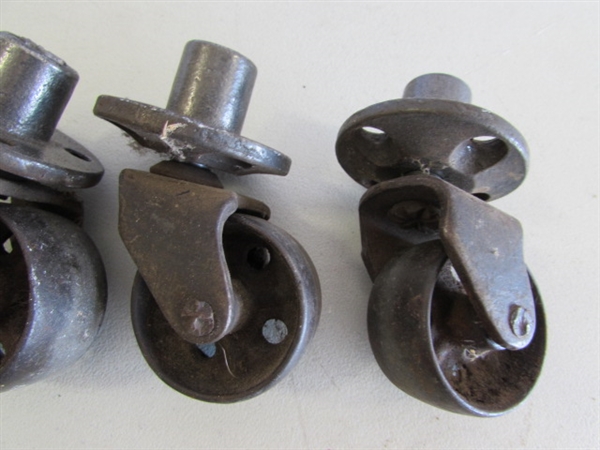 2 SETS OF 4 METAL CASTORS