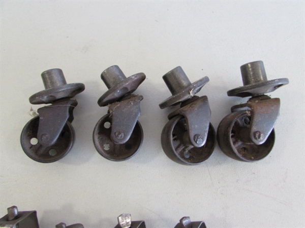 2 SETS OF 4 METAL CASTORS