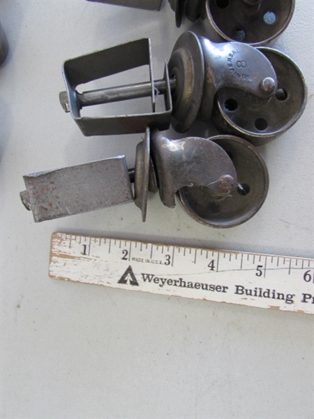2 SETS OF 4 METAL CASTORS