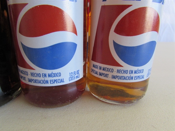 COLLECTIONS OF MOSTLY PEPSI BOTTLES & CANS PLUS A FEW OTHER BOTTLES