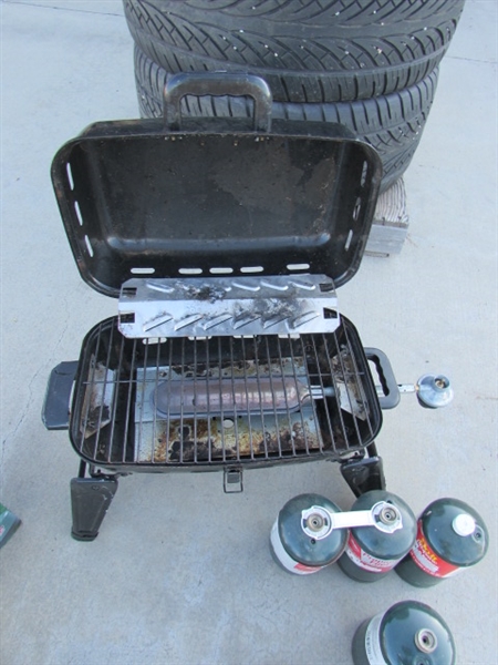 BATTERY POWERED LANTERNS, PROPANE BBQ & PROPANE BOTTLES (EMPTY)