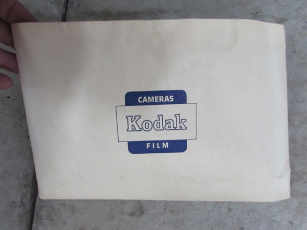 DA-LITE PROJECTOR SCREEN & KODAK SUPER 8 INSTAMATIC M50 PROJECTOR & FILM REELS