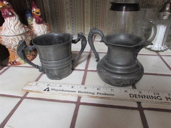 VINTAGE SILVERPLATE CREAMER, SALT & PEPPER SHAKERS, CERAMIC ROOSTERS, BRASS BULL HEAD SKEWERS & VINTAGE ROLY POLY GLASS PITCHER W/ONE GLASS