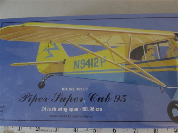 PIPER SUPER CUB 95 BALSA AIRPLANE KIT, POLICE 4X4 FRICTION POWERED TRUCK AND MINI DIE CAST AIRPLANE