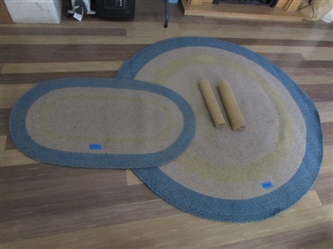 2 WOVEN OVAL RUGS