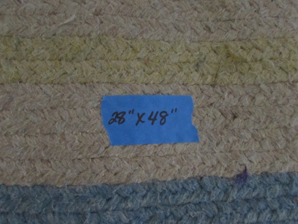 2 WOVEN OVAL RUGS