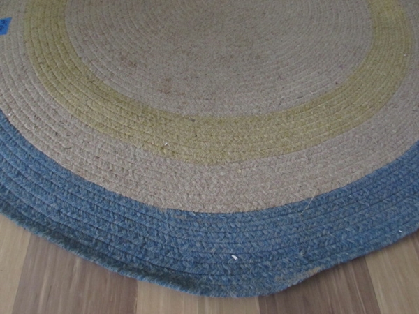 2 WOVEN OVAL RUGS