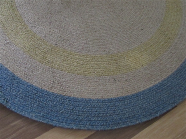 2 WOVEN OVAL RUGS