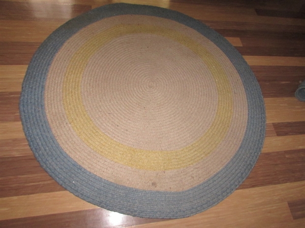 2 WOVEN OVAL RUGS