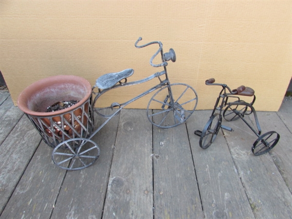 2 METAL DECORATIVE TRICYCLES, ONE WITH POT HOLDER