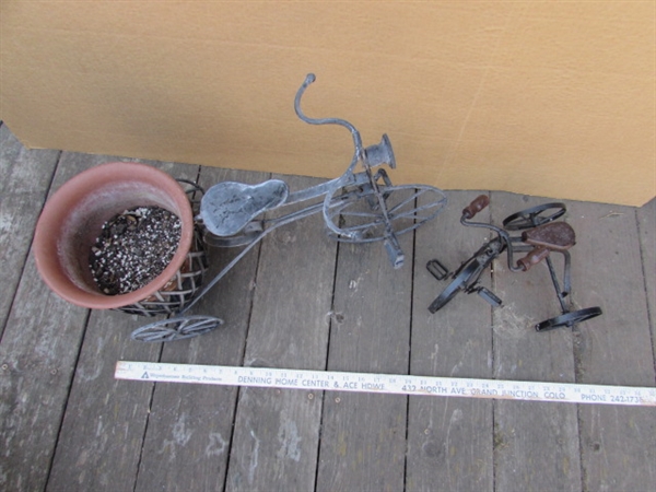 2 METAL DECORATIVE TRICYCLES, ONE WITH POT HOLDER
