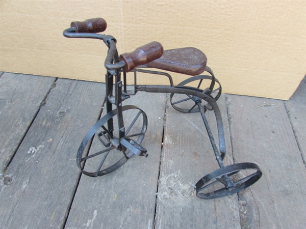 2 METAL DECORATIVE TRICYCLES, ONE WITH POT HOLDER