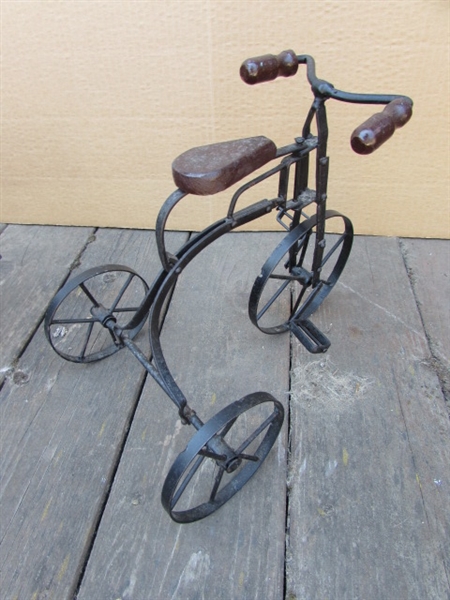 2 METAL DECORATIVE TRICYCLES, ONE WITH POT HOLDER