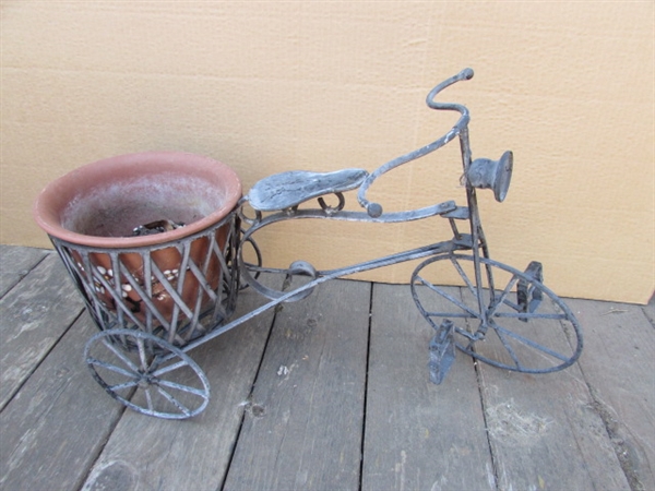 2 METAL DECORATIVE TRICYCLES, ONE WITH POT HOLDER